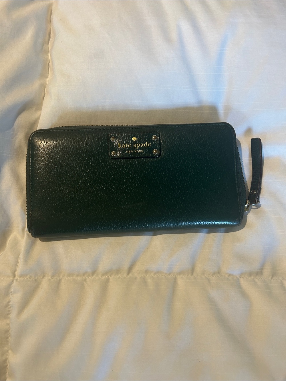 kate spade dark green zip-around wallet with wristlet